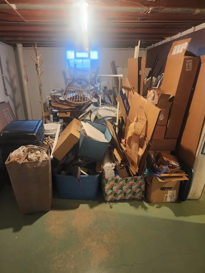 Roll-off dumpster container at job site for 2 Yard Dumpster Rental in Southbridge Town